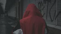 Person in red hoodie 