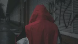 Person in red hoodie 