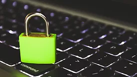 Green padlock on keyboard