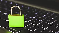 Green padlock on keyboard