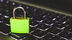 Green padlock on keyboard