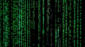 Vertical green code on black screen