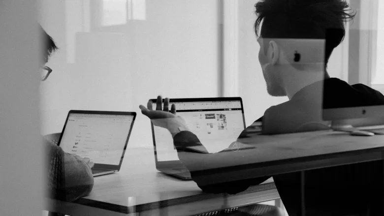 Two people working together 