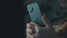 Person on iPhone 