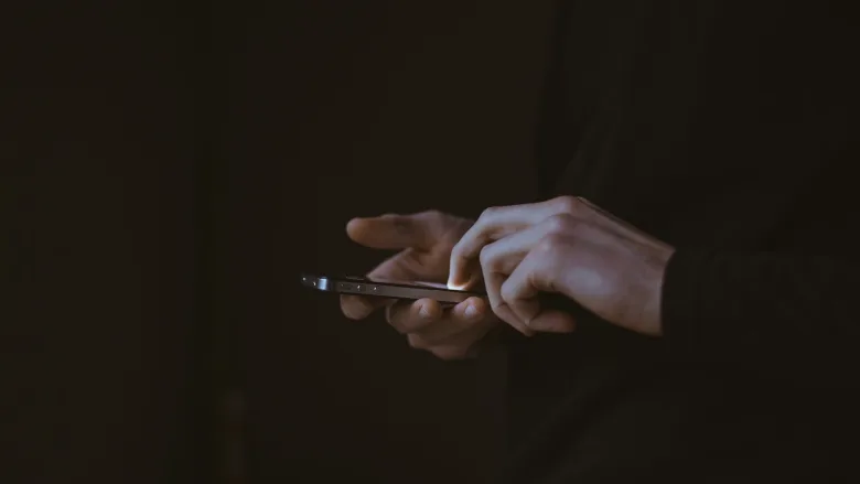 Person holding phone 