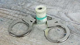 Handcuffs and cash 