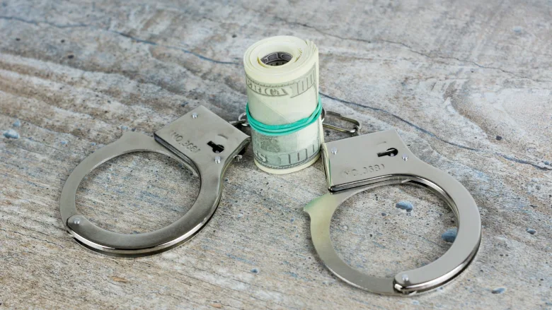 Handcuffs and cash 