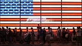 American flag lit with people American flag lit with people