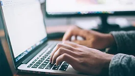 Person working on laptop 