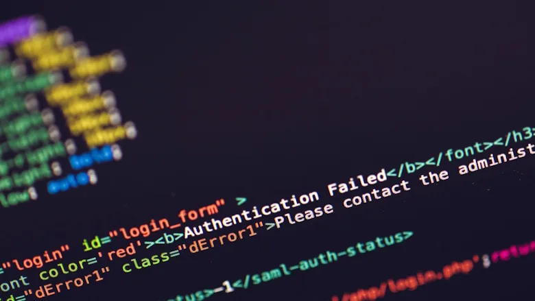 Multicolored code on black computer screen