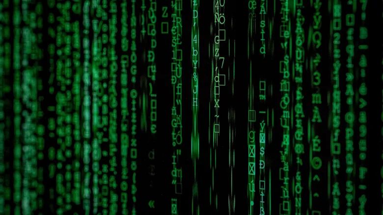 Vertical green code on black screen