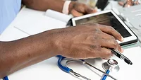 Medical professional using tablet Medical professional using tablet