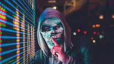 Man in mask by LED light 