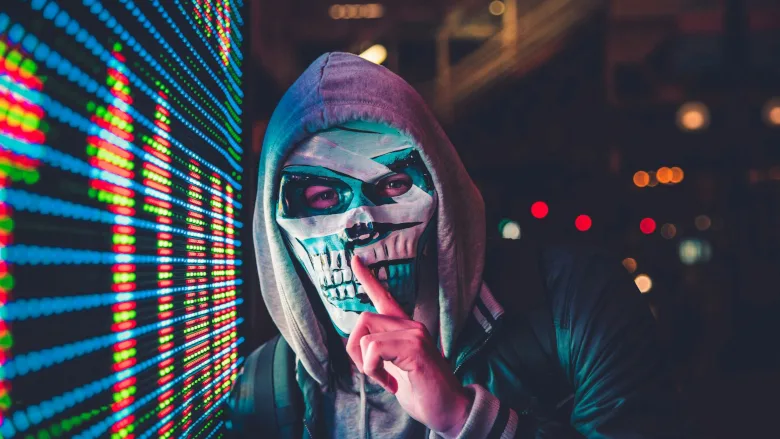 Man in mask by LED light