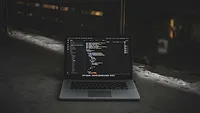 Laptop with coding Laptop with coding