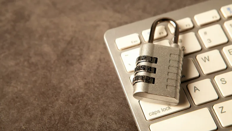 Closed padlock on keyboard Closed padlock on keyboard