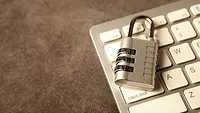 Closed padlock on keyboard Closed padlock on keyboard