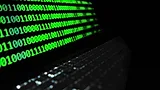 Laptop with green code Laptop with green code