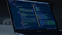 Laptop with coding Laptop with coding