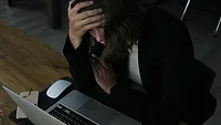 Stressed woman at laptop Stressed woman at laptop