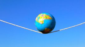 globe on a tightrope