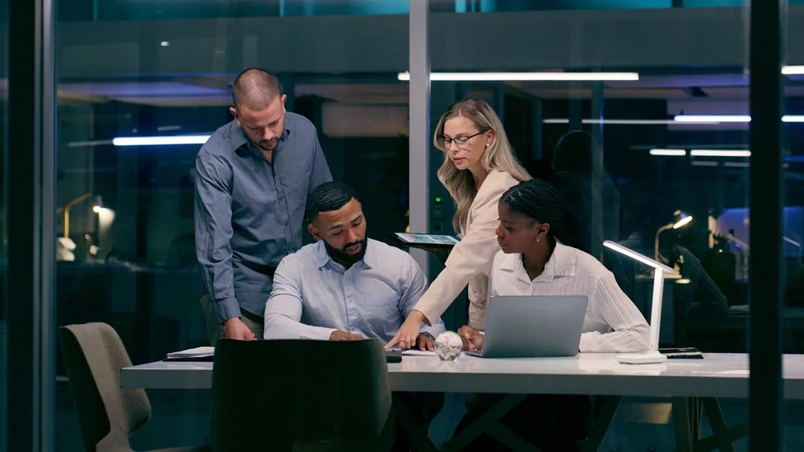 Cyber professionals collaborating in office