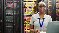 female technician in server room