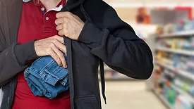 Man stealinga pair of jeans