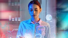 Businesswoman using artificial intelligence on the smart digital tablet device