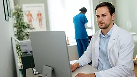 Healthcare worker on computer