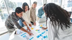 Diverse Team Collaborating on Business Analysis