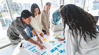 Diverse Team Collaborating on Business Analysis