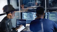 computer programmers working together computer programmers working together