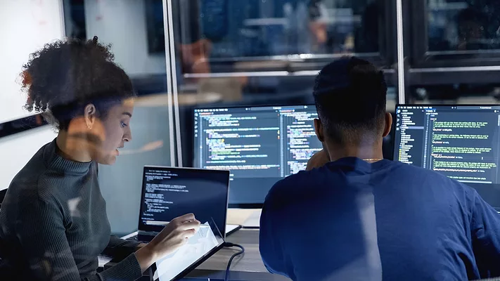 computer programmers working together